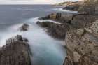 Spain, Cabo Blanco. Ocean rock formations and cliff. Art Print